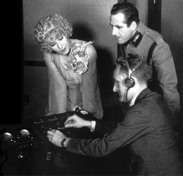 George Groves as stage mixer on the set of Viennese Nights (1930)