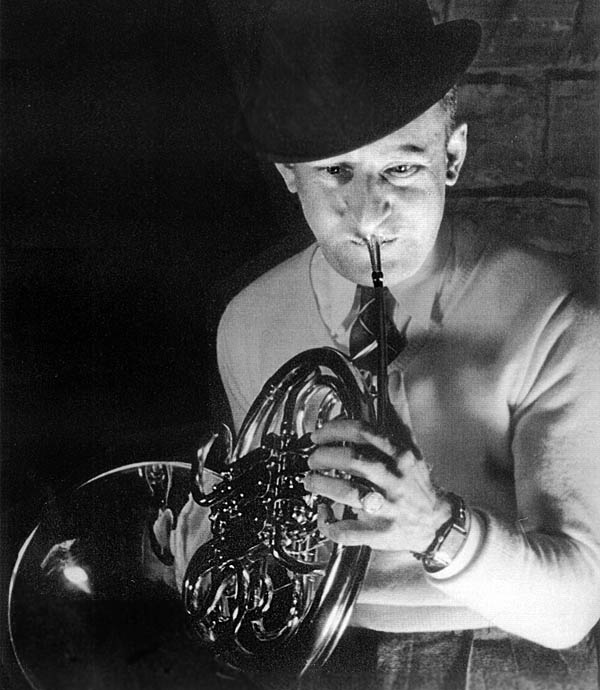 George Groves playing the French Horn George Groves playing the French Horn
