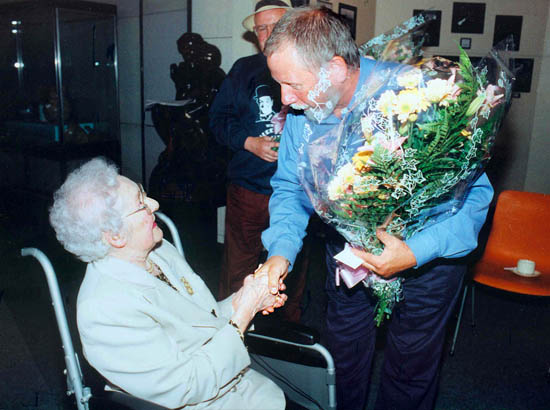 Alan Whalley of the St Helens Star presents Hilda Barrow with a bouquet Alan Whalley of the St Helens Star presents Hilda Barrow with a bouquet