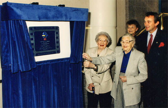Hilda Barrow and Molly Watkins unveil the plaque in London's West End watched by Peter Dobson Hilda Barrow and Molly Watkins unveil the plaque in London's West End watched by Peter Dobson