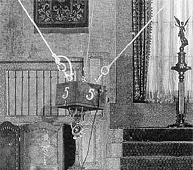 Microphone and Condenser Transmitter Amplifier suspended from rope on George Jessel short at Manhattan Opera House Microphone and Condenser Transmitter Amplifier suspended from rope on George Jessel short at Manhattan Opera House