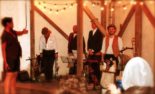 Quiet Little Englishman band” alt=