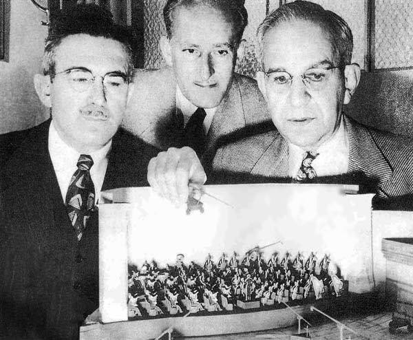 George Groves c.1946 examining a miniature film set with Colonel Nathan Levinson, the Director of the Sound Department at Warners George Groves c.1946 examining a miniature film set with Colonel Nathan Levinson, the Director of the Sound Department at Warners