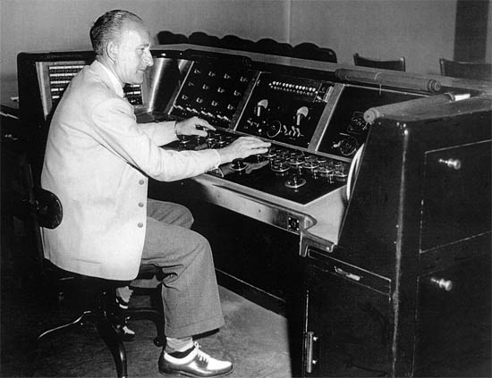 George Groves at a Warner Brothers dubbing console in their studios in Burbank George Groves at a Warner Brothers dubbing console in their studios in Burbank