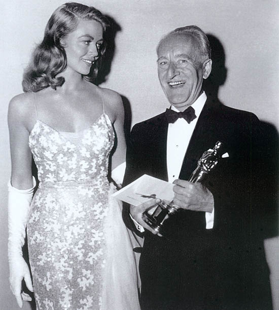 George Groves receives the Oscar for Best Sound from Dorothy Malone for Sayonara George Groves receives the Oscar for Best Sound from Dorothy Malone for Sayonara