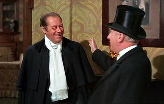 In this scene in My Fair Lady the radio microphone is concealed within Henry Higgins' scarf In this scene in My Fair Lady the radio microphone is concealed within Henry Higgins' scarf