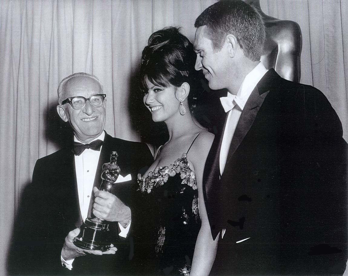 George Groves receiving his Best Sound Oscar for My Fair Lady from Claudia Cardinale and Steve McQueen George Groves receiving his Best Sound Oscar for My Fair Lady from Claudia Cardinale and Steve McQueen
