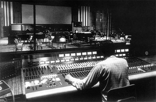 The scoring console with stage, orchestra and projection screen at the Groves-Rice complex at Burbank Studios The scoring console with stage, orchestra and projection screen at the Groves-Rice complex at Burbank Studios